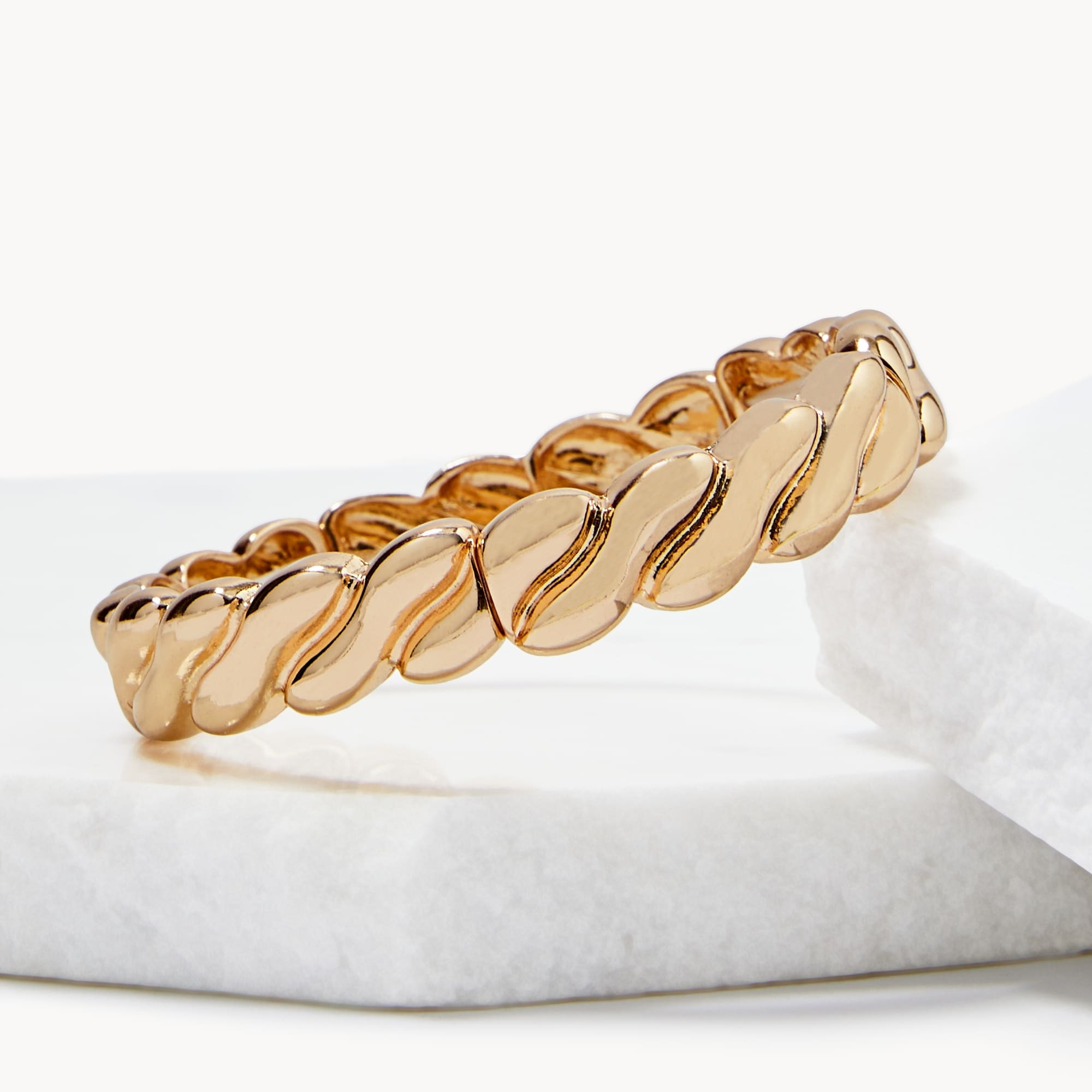 Twisted Effect Stretch Bracelet in Gold from Joe Fresh