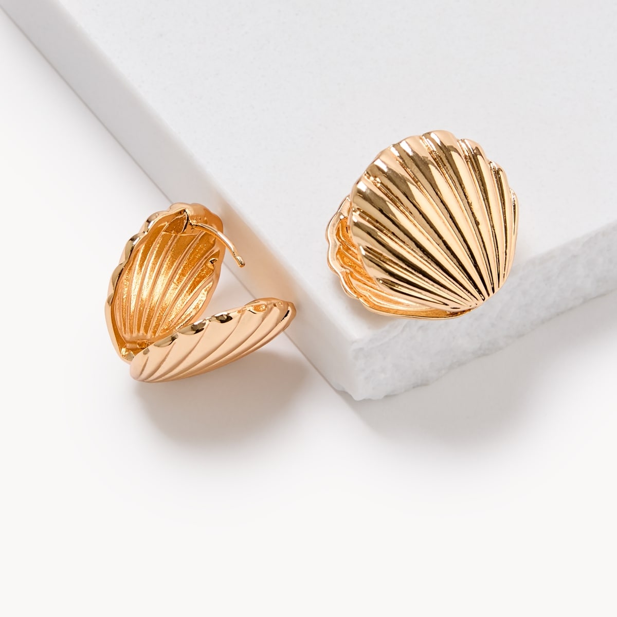 Boucles doreilles en forme de coquillage