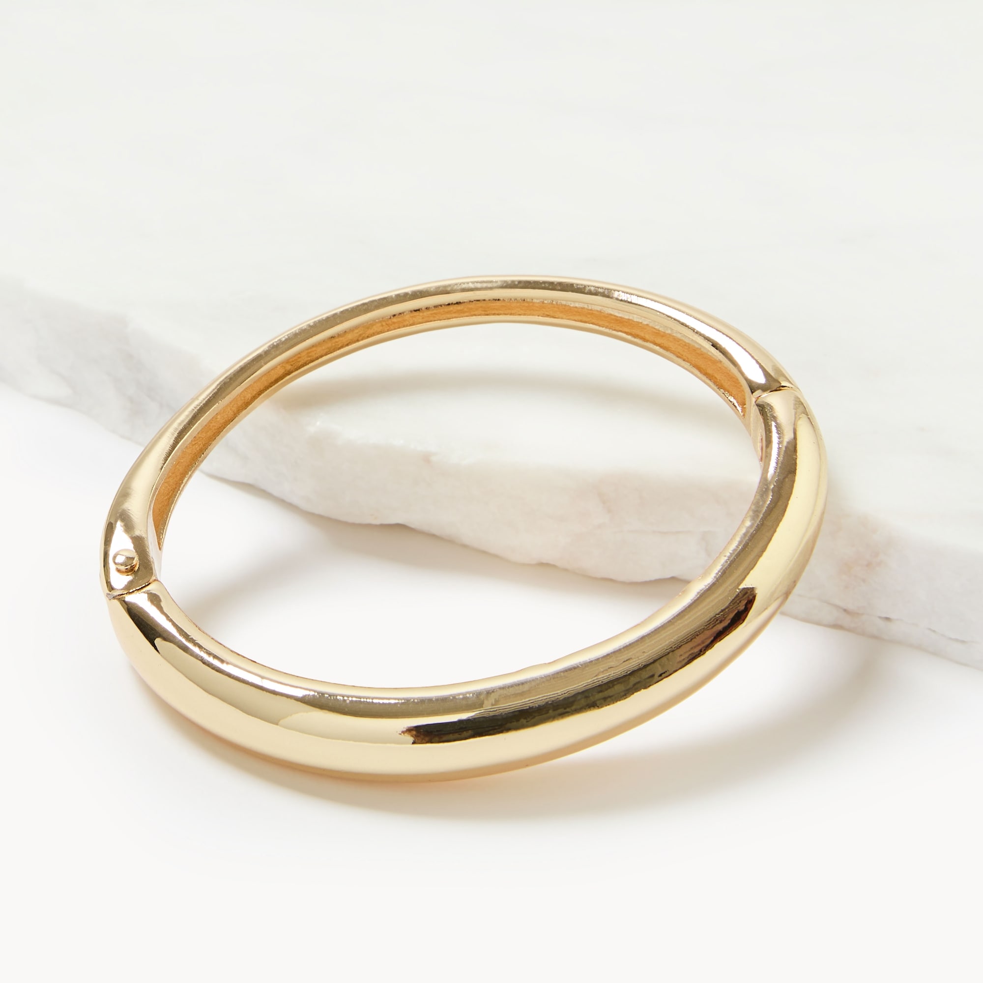 Bracelet rigide à charnière doré