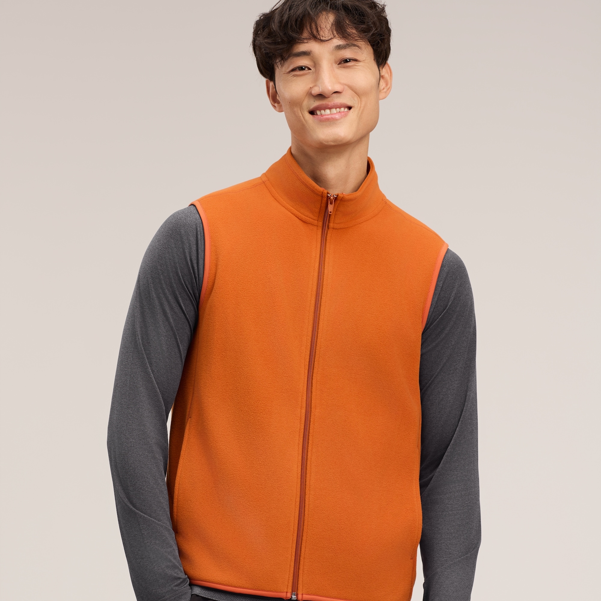 Men's Active Fleece Vest in Dusty Orange from Joe Fresh