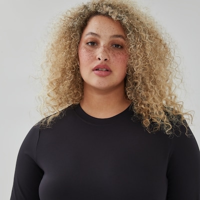 Haut sport à manches longues extensible Femmes+ - Noir