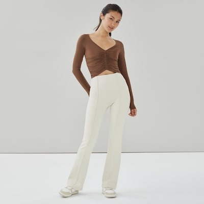 Pantalon sport évasé à rayures fines - Beige
