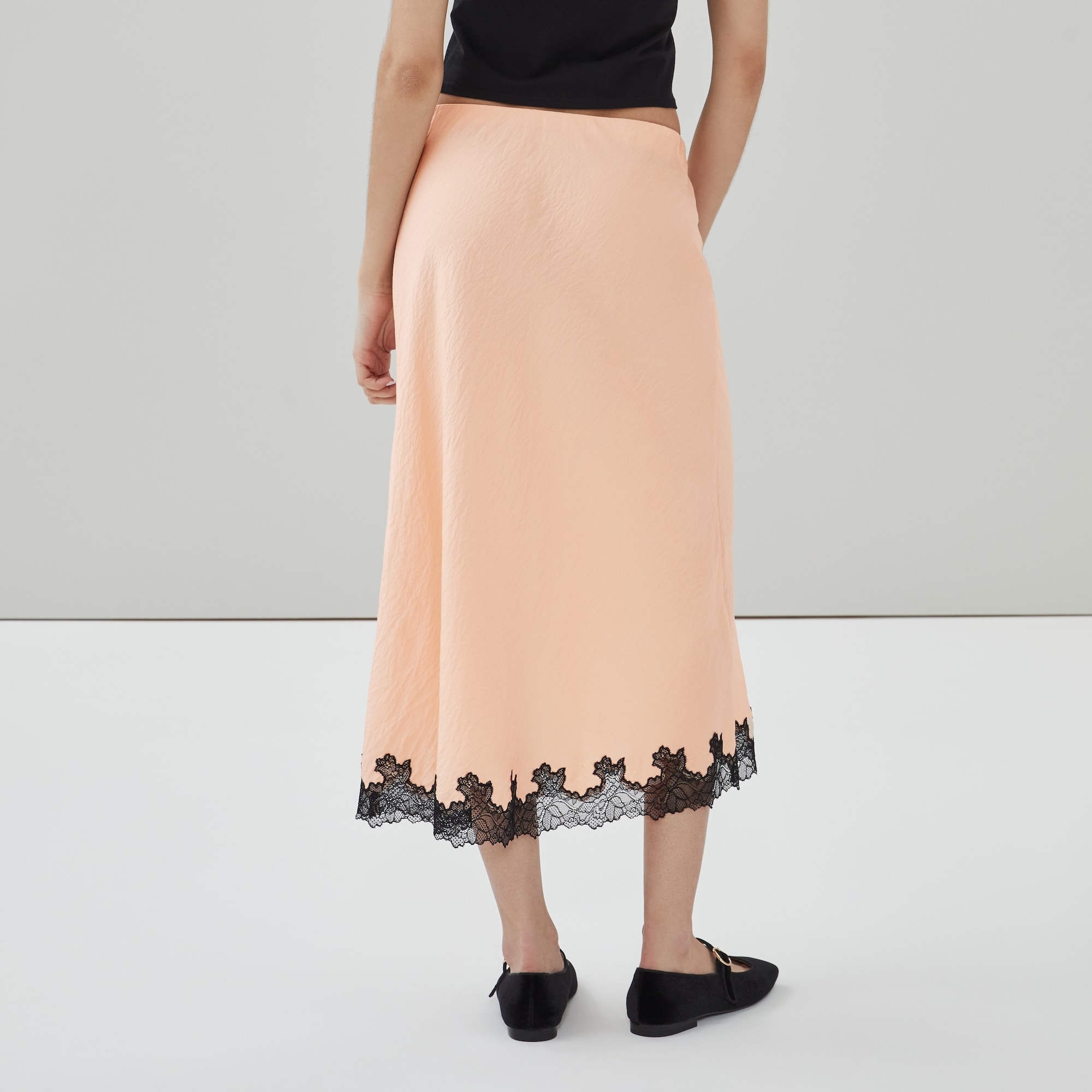 Lace Trim Satin Slip Skirt in Peach from Joe Fresh