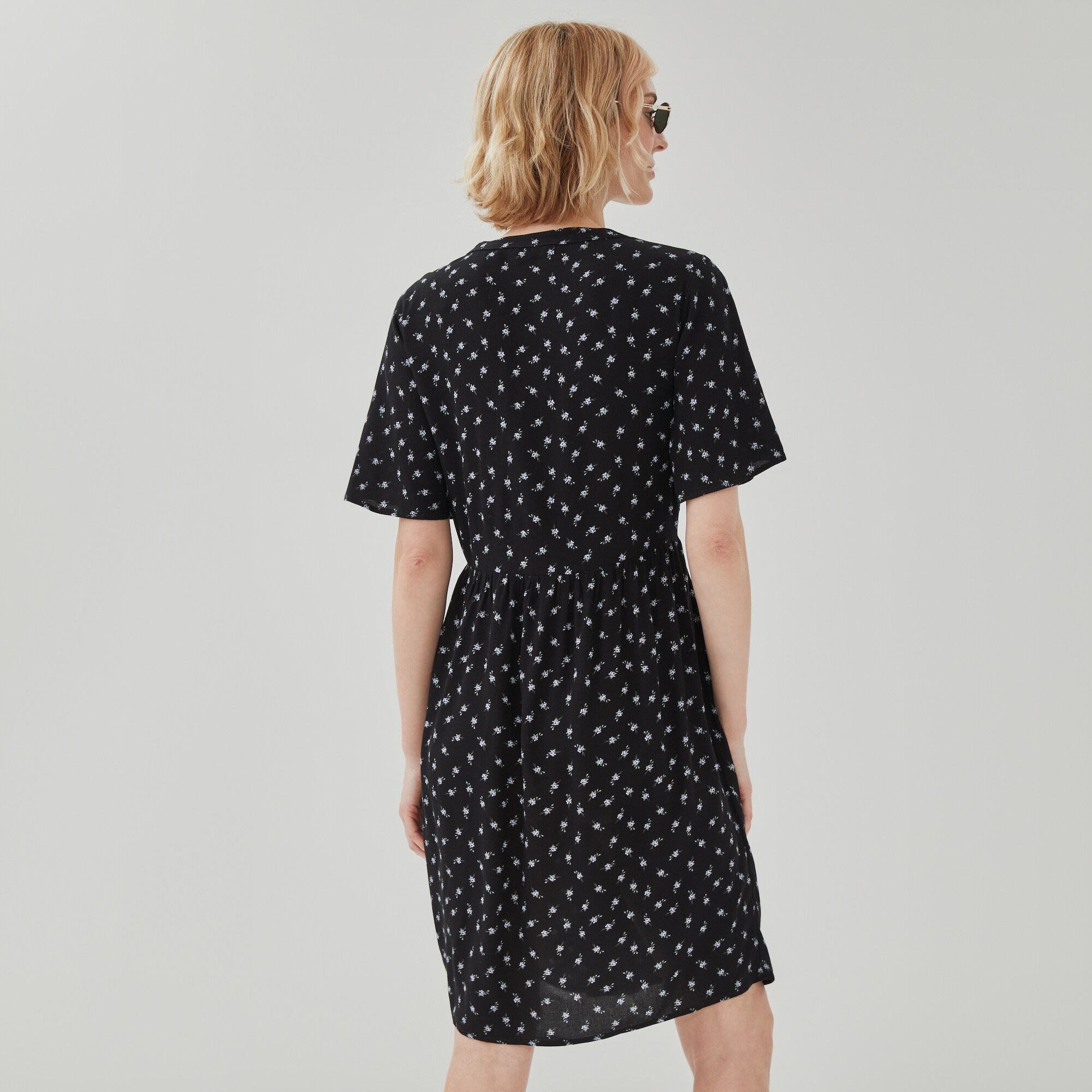 Printed V-Neck Mini Dress in Black from Joe Fresh