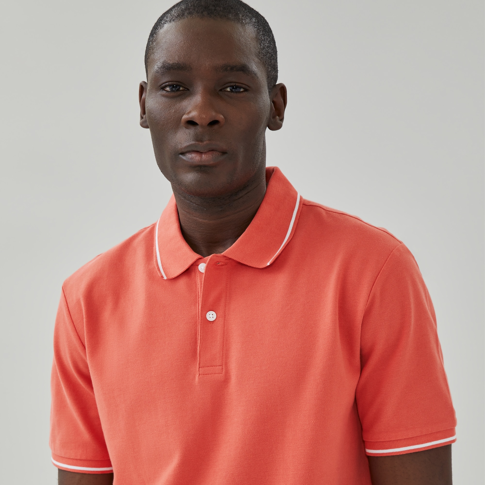 Men's Essential Pique Polo in Dusty Coral from Joe Fresh
