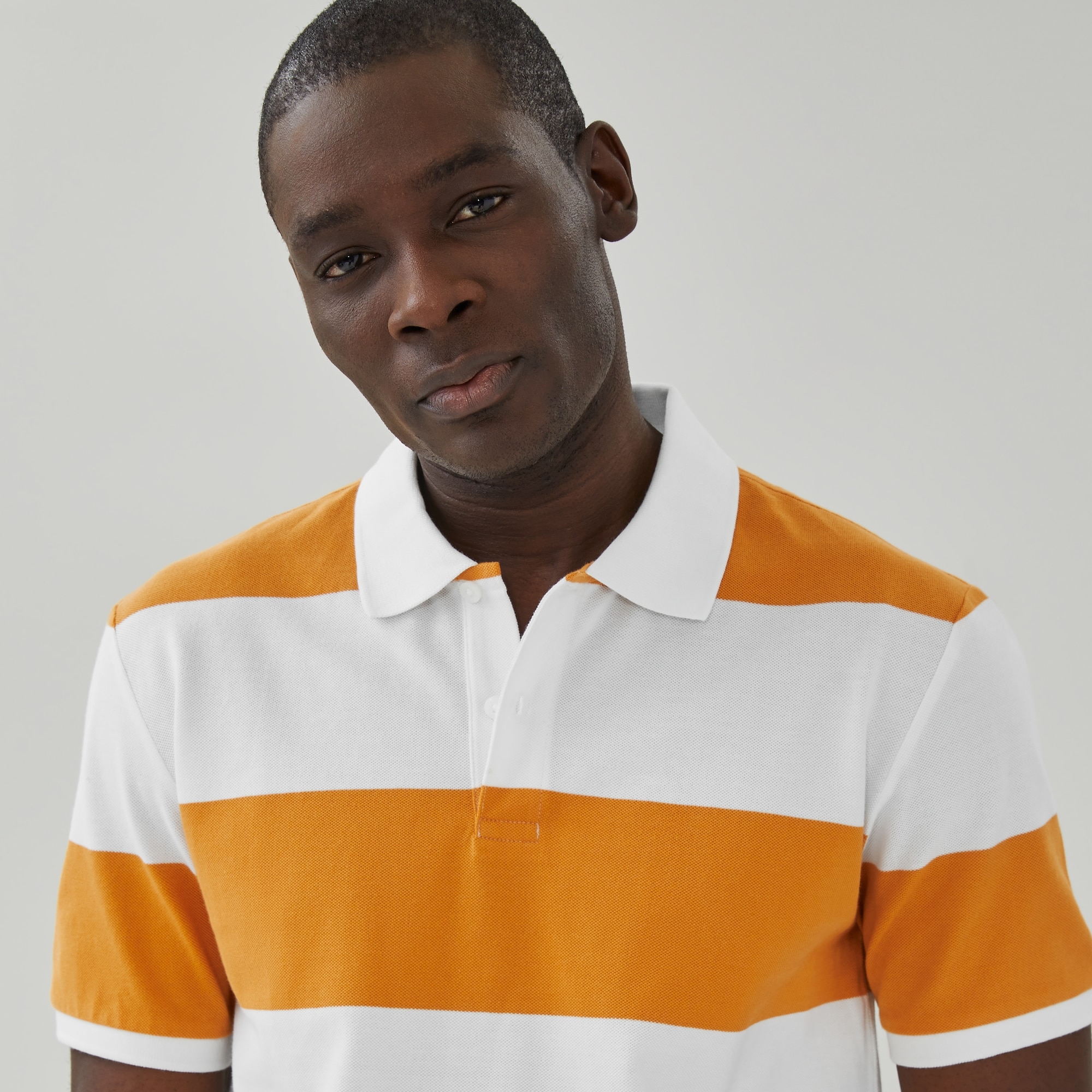 Men's Essential Striped Pique Polo in Yellow from Joe Fresh
