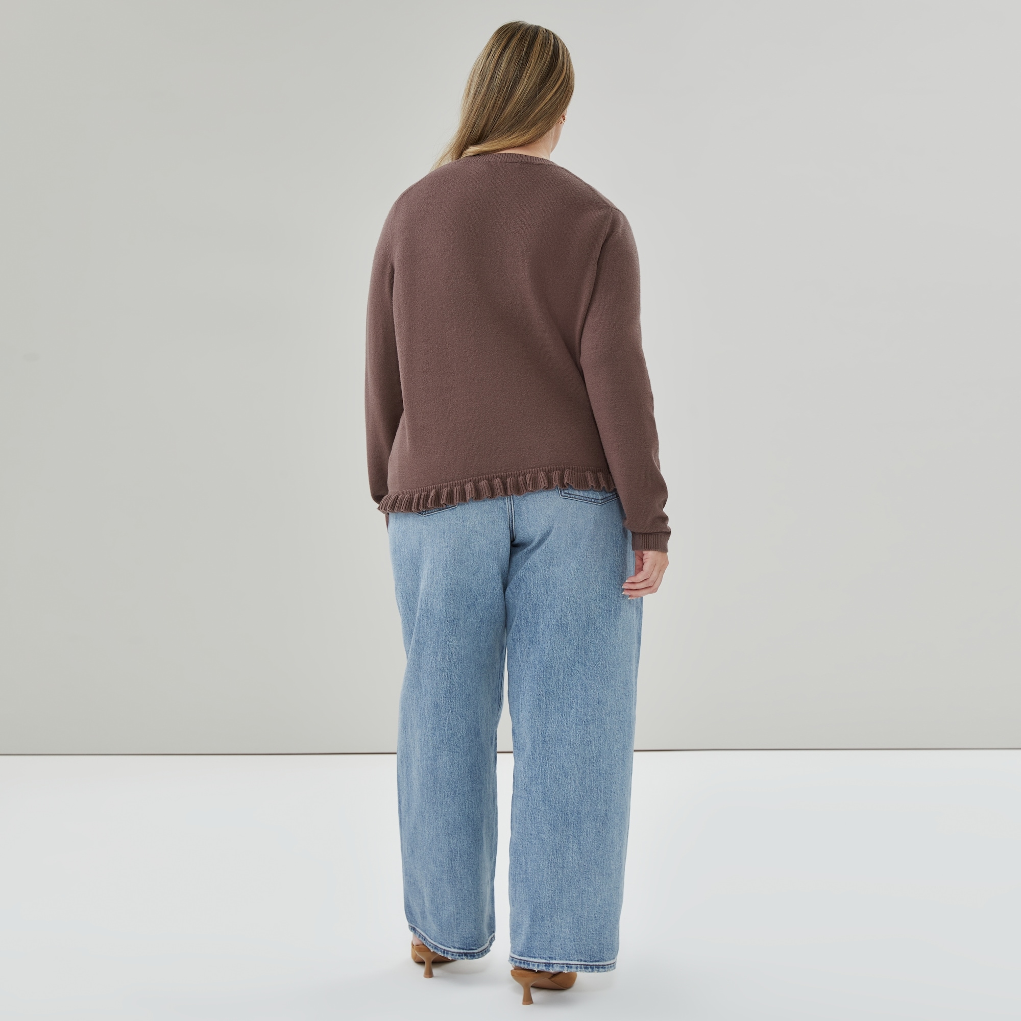 Women+ Ruffled Hem Sweater
