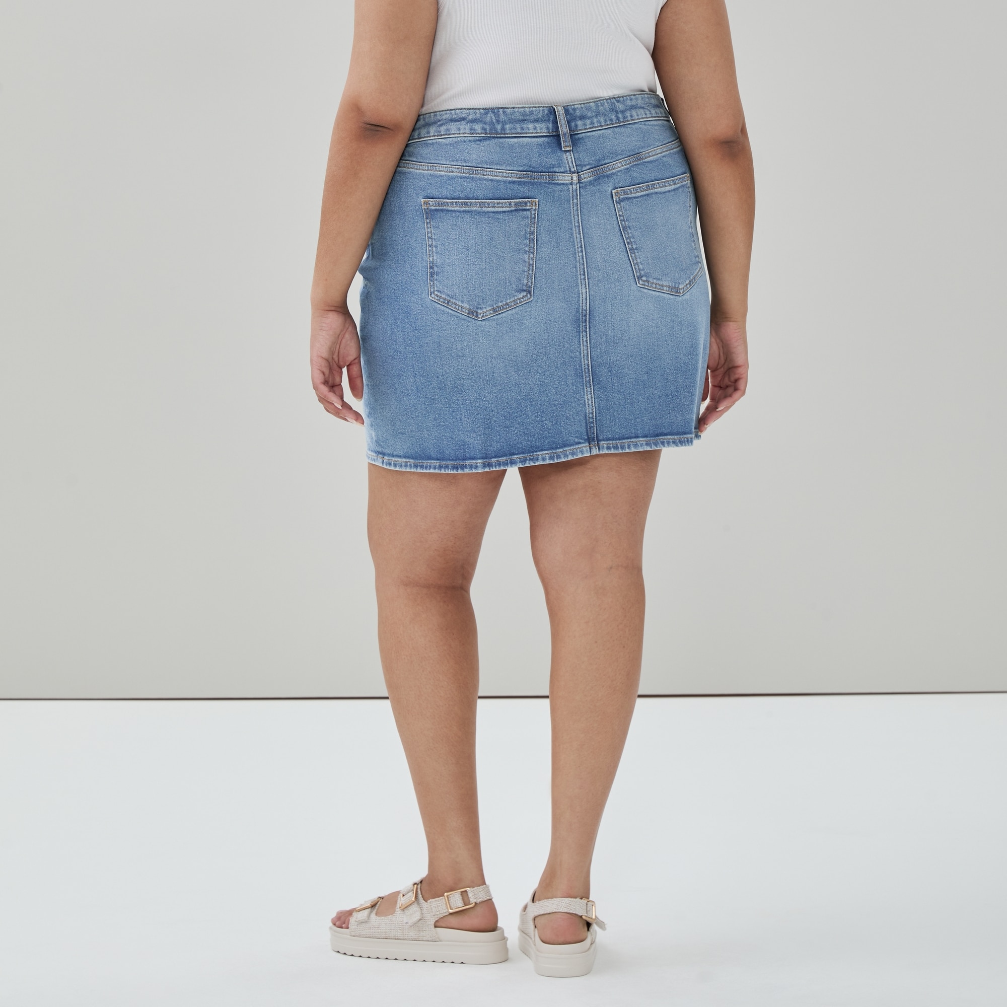 Women+ Denim Mini Skirt in Medium Wash from Joe Fresh