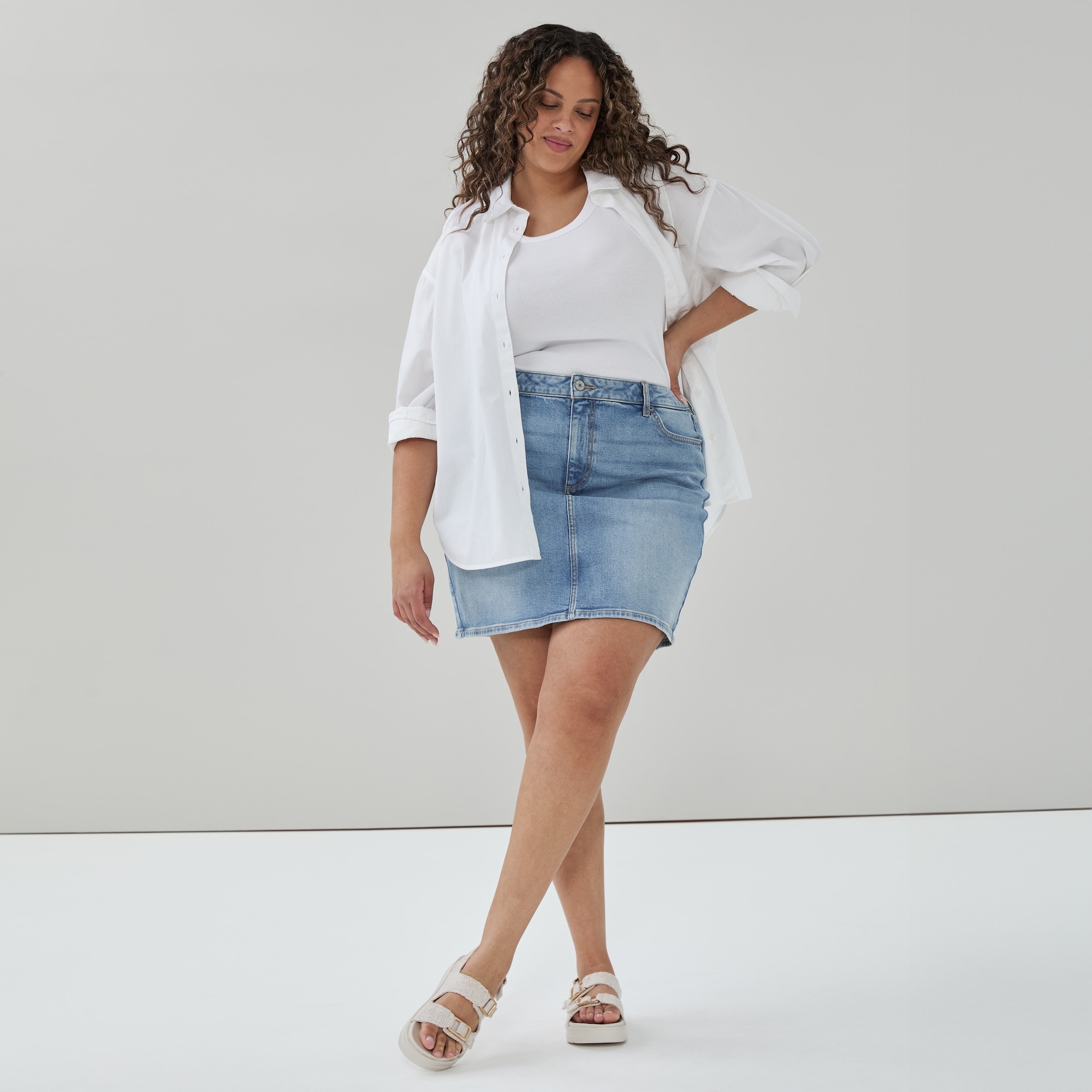 Women+ Denim Mini Skirt in Medium Wash from Joe Fresh