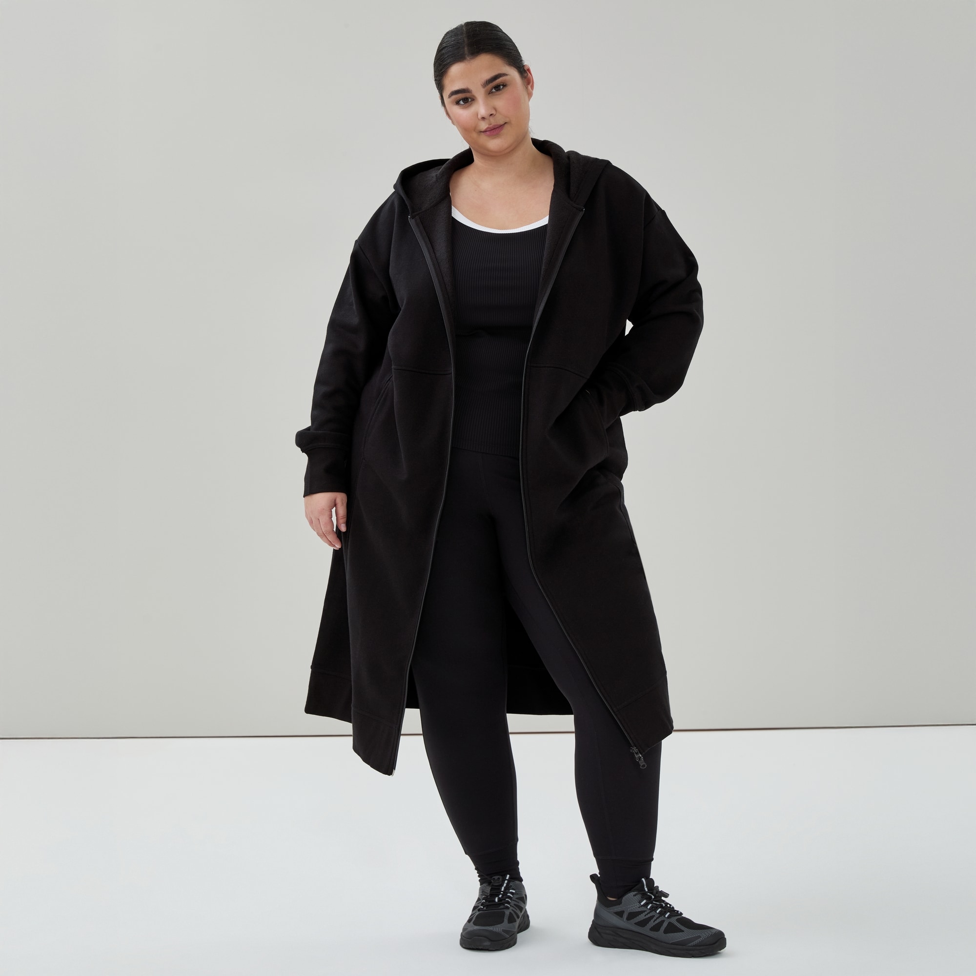 Women+ CozyFleece Long Hooded Jacket in Black from Joe Fresh