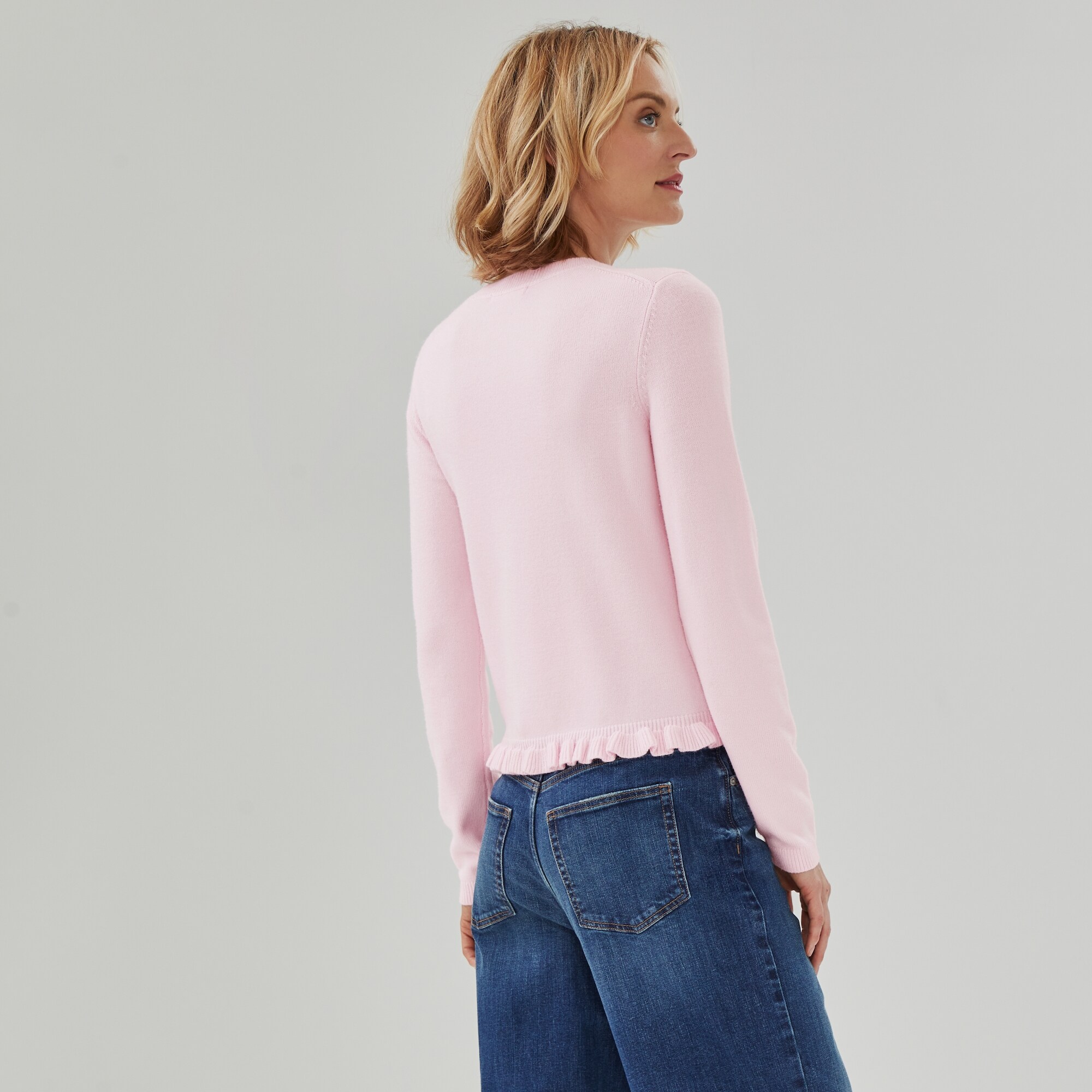 Chandail en tricot avec ourlet à volants