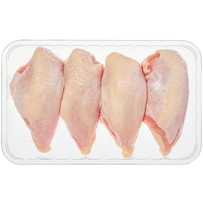 Poitrines de poulet avec os et peau