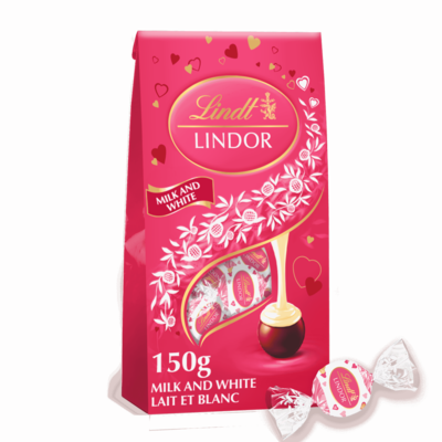 Lindt Lindor Milk Chocolate With A Delectably Smooth White Centre Milk And White Limited Edition 150 g, $7.33/100g