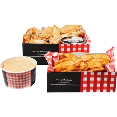 null 14 Chicken Wings with Wedges and Mac & Cheese (Available After 11am) 861 g, $2.09/100g