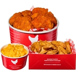 null 18 Buffalo Flings au poulet avec des wedges et du Mac & Cheese (disponible après 11 heures) 915 g, 1,97 $/100g