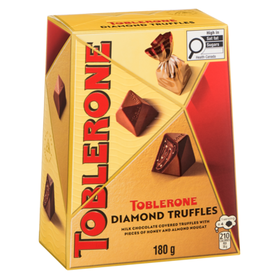 Milk Chocolate Covered Truffles With Pieces Of Honey And Almond Nougat Diamond Truffles