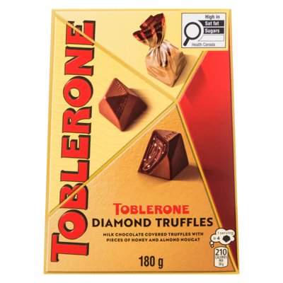 Milk Chocolate Covered Truffles With Pieces Of Honey And Almond Nougat Diamond Truffles