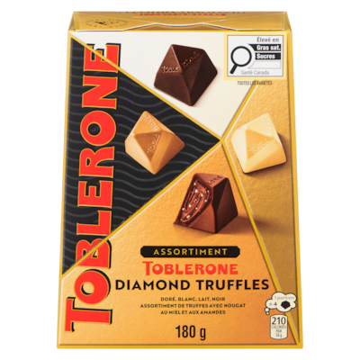 Toblerone Doré, blanc, lait, noir assortiment de truffes avec nougat au miel et aux amandes diamond truffles 180 g, 7,78 $/100g