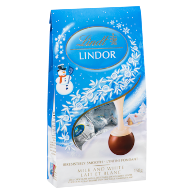 Chocolat au lait fourré d'un onctueux fondant blanc