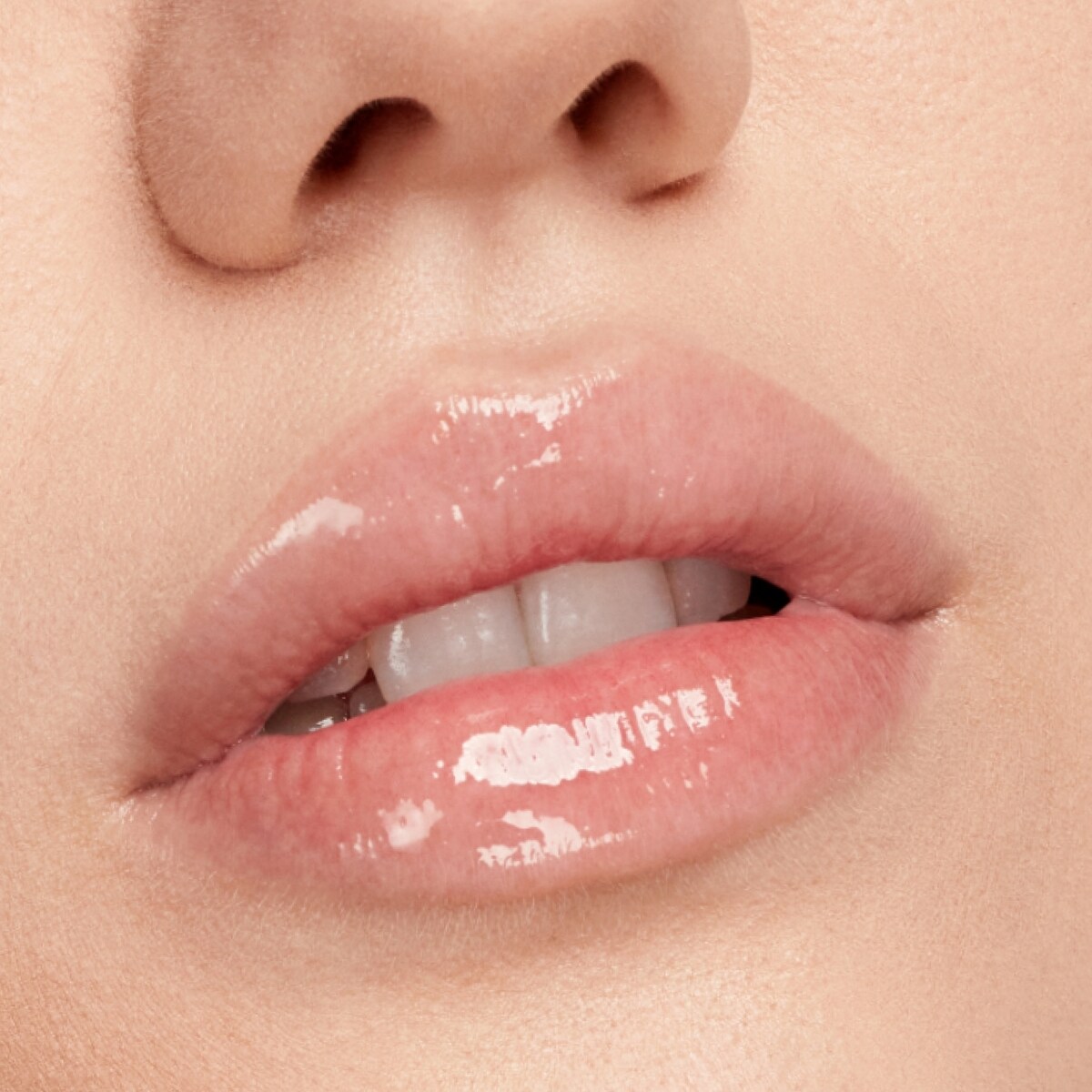 utmost importance plumping lipgloss